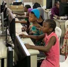 Girls at work in ICT class, Uganda