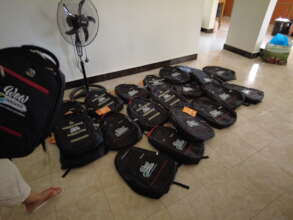 Providing book bags and uniforms