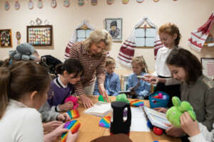 Teacher introduces a book to the class