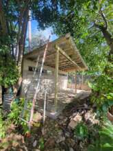 A future community kitchen in Loiza PR has a roof.