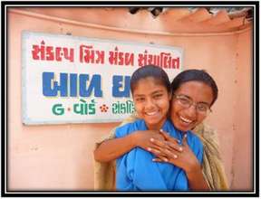 Shahin with her teacher Firdos