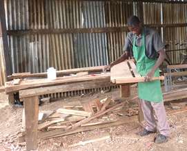 Bosco making a Bed in his rented Workshop