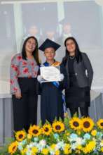 Valedictorian receiving his High School diploma