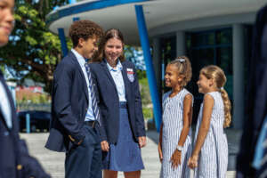 Head Boy & Head Girl with primary students