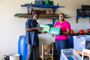 William and Tisha are making the bricks