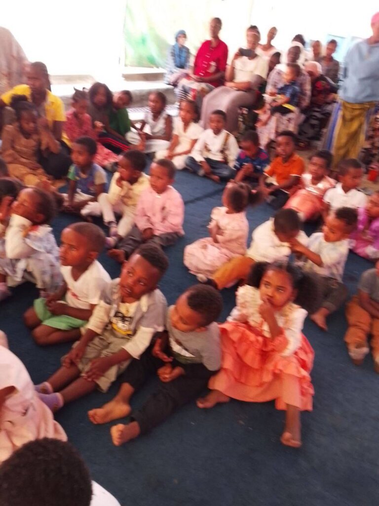 partial view of kids during their daily meal