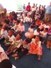 partial view of  kids during their daily meal