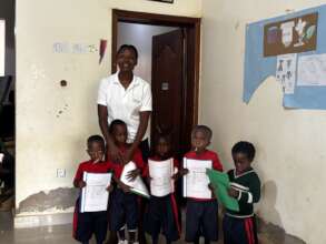 Kids and teacher during reporting session