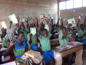 Class JHS2 students with their new textbooks.