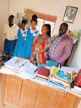 Some pupils with the director at office