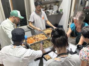 The Saffron Kitchen Team preparing to feed 500