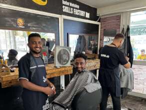 All smiles at the selfm.aid Barber Shop!