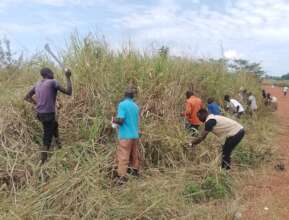 Youth doing Bush Clearing