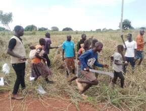 Youth doing Bush Clearing
