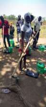 Beneficiaries after receiving their farming tools