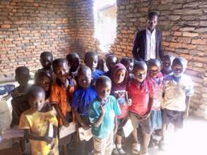 Founder and Director, Michael with school children