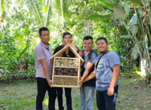 Youth caring for native pollinators
