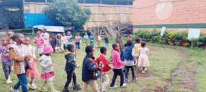 Partial picture of  M  chalder at Out door play