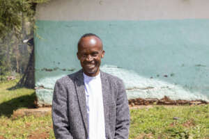 Wondmagne outside his classroom