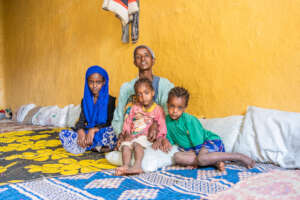 Asma (35) with her children