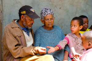 Meskerem with her father Teshome and grandma Nuram