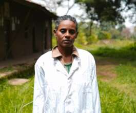Teshalech getting ready for work in her community