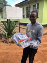 Chanda collecting his school supplies!