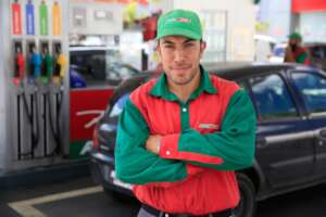 Hugo, a free Espartano, working at a gas station