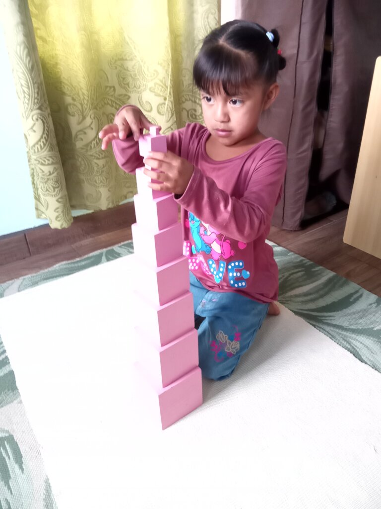 Student working with hands on materials