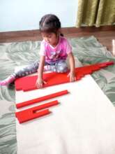 Students working with hands on length materials