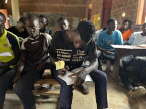 TYoFU Youth Taking Notes in Session