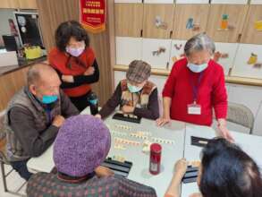 Enjoying a game of Rummikub 1