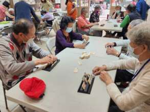 Enjoying a game of Rummikub 2