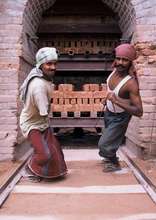 Community managed vertical shaft brick kiln