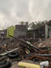 Damaged houses due to the high waves