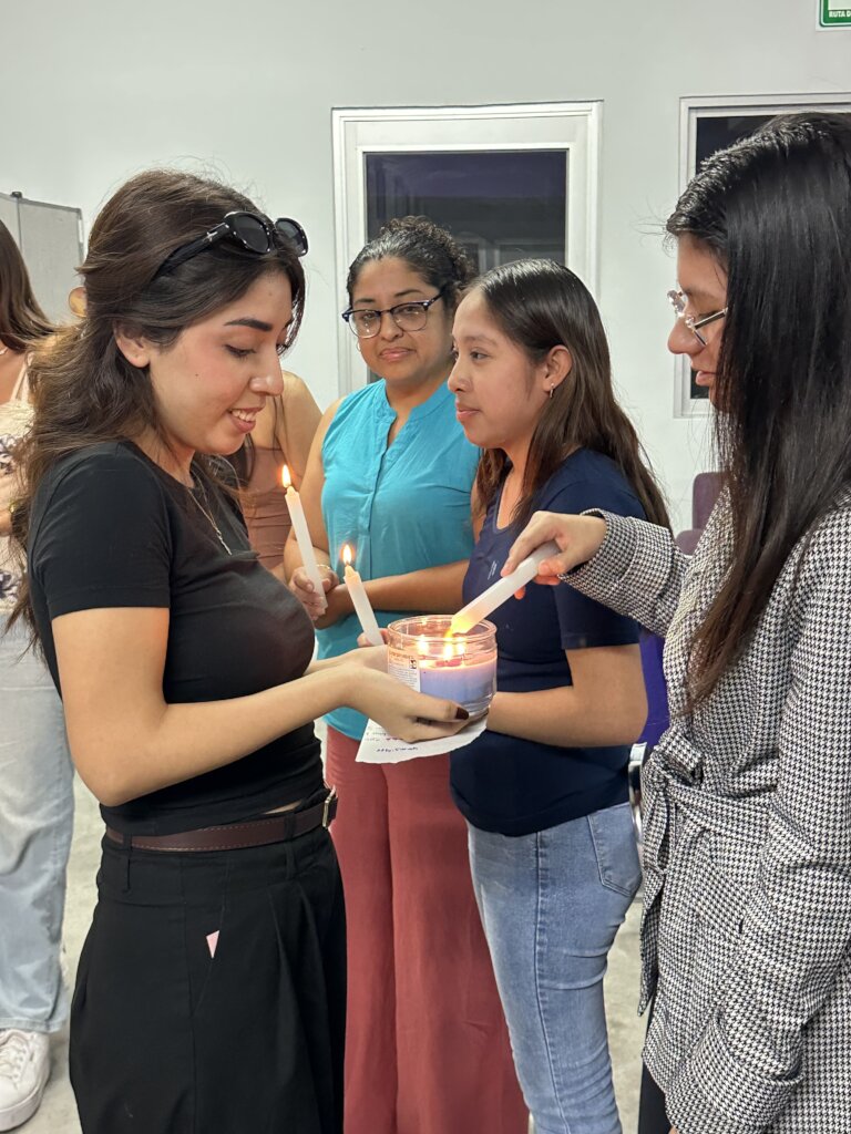 CORDEM graduate candle ritual