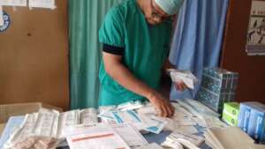 Dr Anthony sorting dressing provided by Inter Care