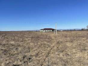 View of Blossom Cottage with power line approach