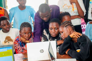 PARTICPANTS WITH A FACILITATOR DURING GROUP WORK