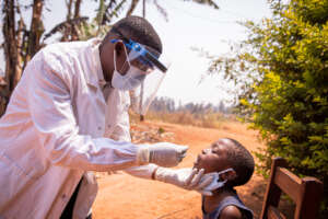 Doctor attending to child