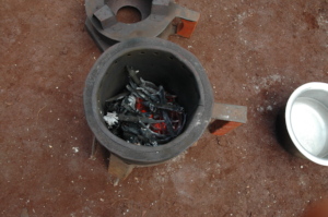 She seems to be using prepared fuel in her stove