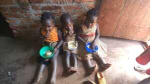 Three of Rosemary's grandchildren enjoying lunch