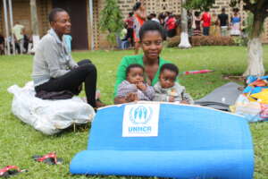 IDP with her twins with items recived from the UNH