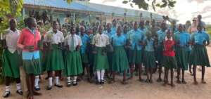 Students holding seedlings.