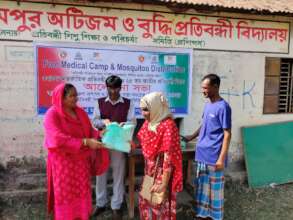 Women received Mosquito Net