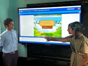 Students learning to use the Digital Board