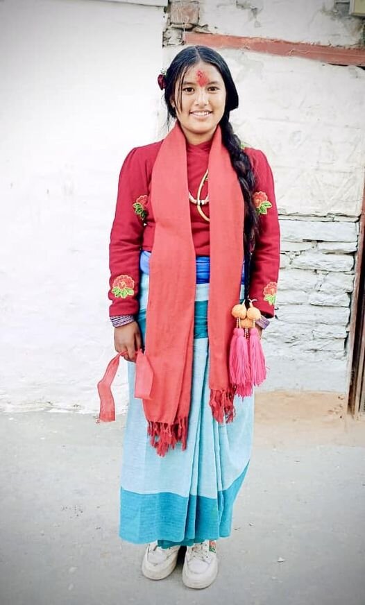 Karishma class-8 on her traditional attire.