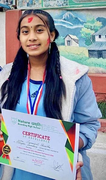 Saraswati class-12 is displaying her awards .