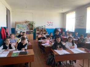 Students listening to a session