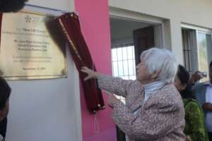 NYF Founder Olga Murray unveiling the new NLC sign